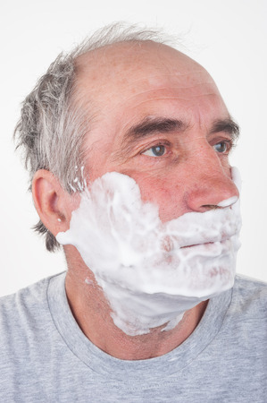 Man shaves his faceの写真素材