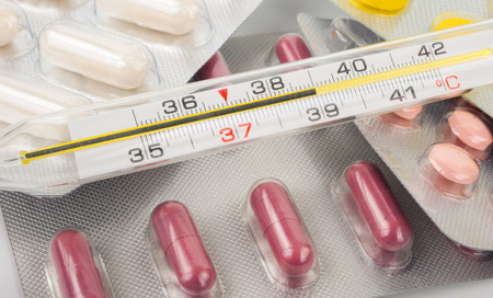 Thermometer and tablets