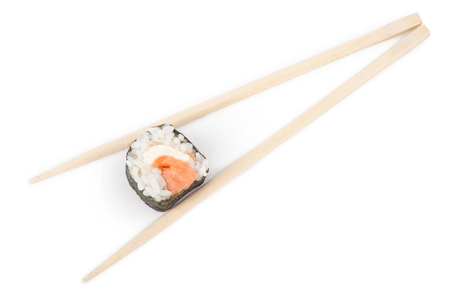Sushi roll with chopsticksの写真素材