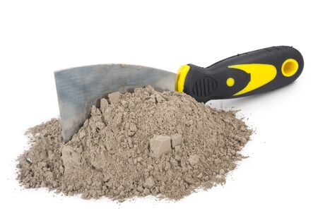 Gray cement powder with trowel