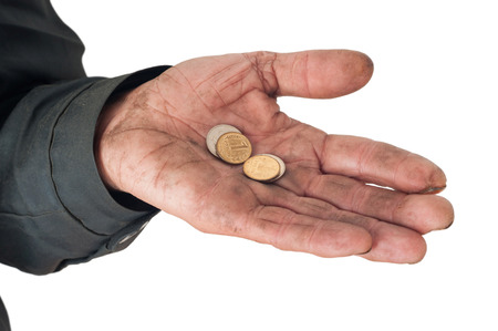 Hand of a beggar with coins