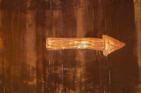 Arrow drawn on metal