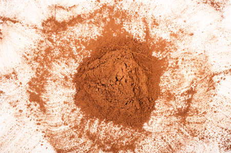 Pile cocoa powder on white backgroundの写真素材