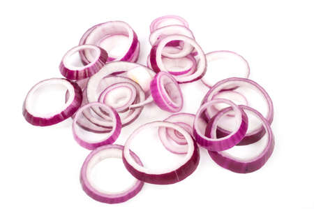 Red onion sliced rings on a white backgroundの写真素材