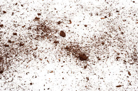 Scattered soil on a white backgroundの写真素材