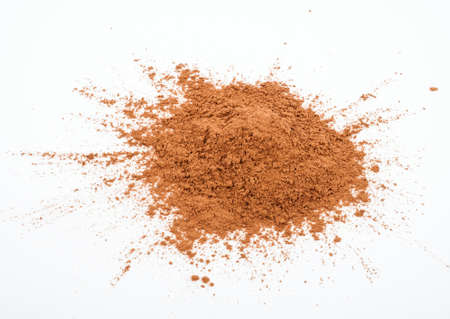 Pile cocoa powder on white backgroundの写真素材