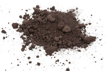 Heap of soil on a white backgroundの写真素材