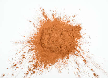 Pile cocoa powder on white background