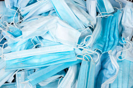 Used medical masks. Texture for design