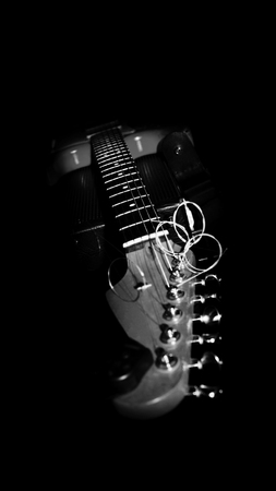 Electric Guitar Resting On Amplifire In Music Studioの写真素材