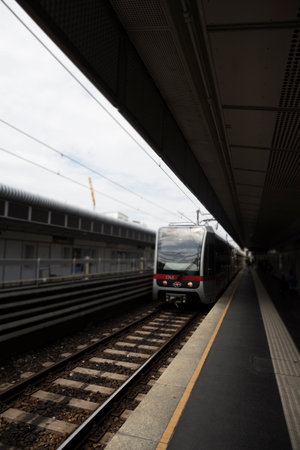 Subway Station Outdoors With Train Approaching Its Stopのeditorial素材