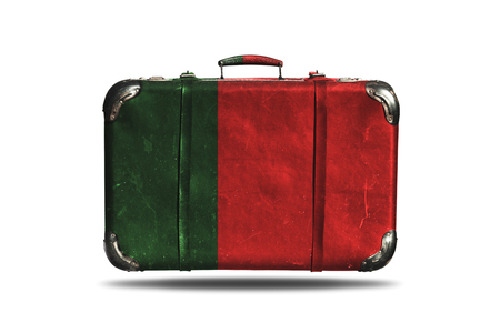 Travel Vintage Leather Suitcase With Flag Of Portugal Isolated On White Backgroundの写真素材