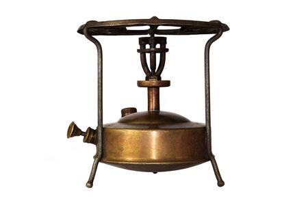 Vintage Kerosene Burner. Old Camping Bronze Stove Primus Isolated 