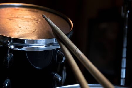 Drumsticks and Drums. Music and musical instruments in music studio