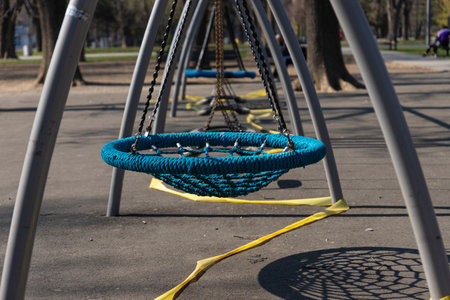 Empty children playground.  Banned for use due to Coronavirus in Belgrade, Serbia. Prevetnion of spreading COVID19のeditorial素材