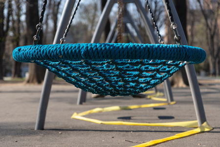 Empty children playground.  Banned for use due to Coronavirus in Belgrade, Serbia. Prevetnion of spreading COVID19のeditorial素材