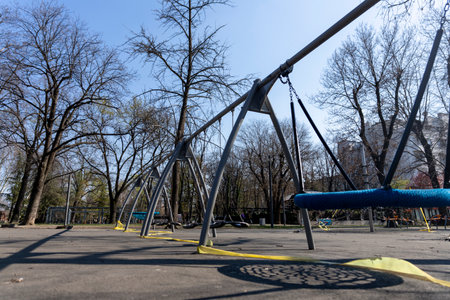 BELGRADE, SERBIA - APRIL 04, 2020: Empty children playground.  Banned for use due to Coronavirus in...