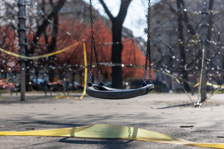 BELGRADE, SERBIA - APRIL 04, 2020: Empty children playground.  Banned for use due to Coronavirus in...
