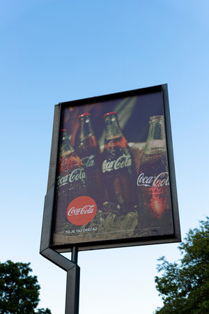 Belgrade, Serbia , May 12 2020 : Coca Cola drink Billboard at Ada Ciganlija lake in Belgrade, Serbia. Illustrative Editorial imageのeditorial素材