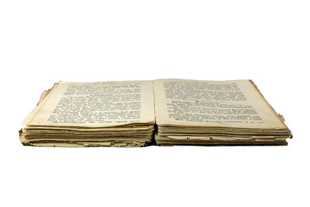 Old opened damaged book isolated on white backgroundの写真素材