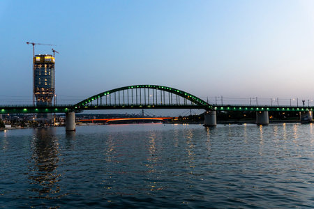 Belgrade, Serbia -  July 27, 2021: View of Belgrade Waterfront Luxury residences and business buildings and Bridge on the Sava river at night in Belgrade, Serbiaのeditorial素材