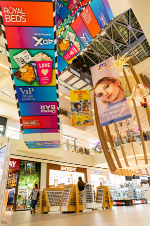 Belgrade, Serbia - November 14, 2020: Interior and interesting escalator, staircases with posters and bilboards at Ada Mall shopping center in Belgrade, Serbiaのeditorial素材
