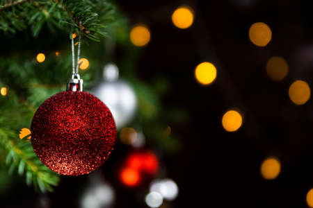 Christmas decoration and ornaments closeup on a Christmas tree. Merry Christmas and Happy New Yearの写真素材