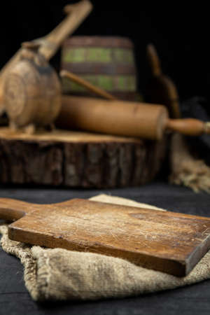 Cutting board in a rustic kitchen with empty space for photo montage