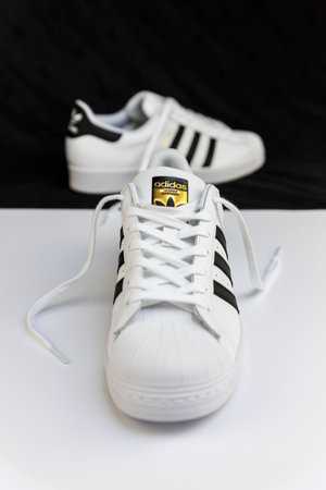 Belgrade, Serbia - May 16 , 2022 : Adidas Superstar original white sneakers. Sport and fashion footware in Belgrade, Serbiaのeditorial素材