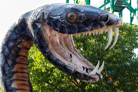 VIENNA, AUSTRIA - October10, 2018: Snake monster statue in amusement park Prater in Vienna, Austriaのeditorial素材