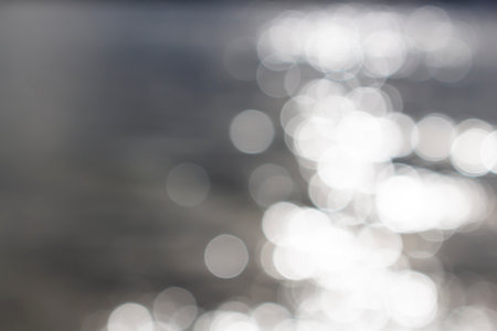Bokeh of lights on water. Blured Background imageのeditorial素材