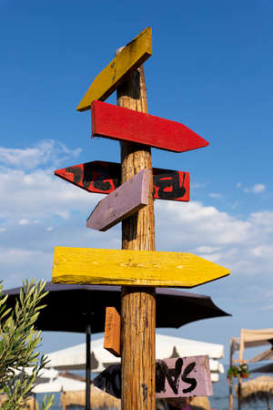 Wooden arrow sign post. Empty boards for your text. Copy space