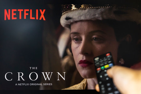 Belgrade, Serbia - September 12, 2022: Watching TV Show The Crown on Netflix with remote control in...