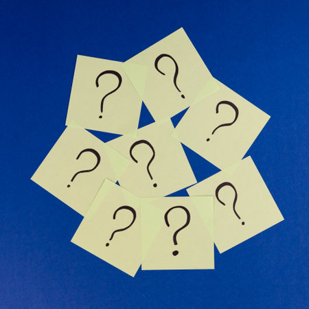 Question marks drawn on sticky notes. Idea, inspiration and creative thinking concept