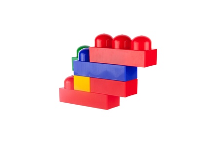 Colorful toy contruction plastic blocks, isolated on white