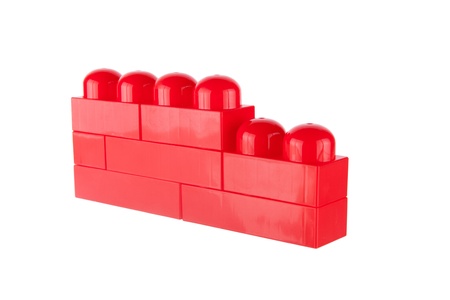 Colorful toy contruction plastic blocks, isolated on white