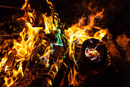 Orange and blue flames of fireの写真素材