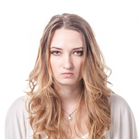 Young woman playing various emotions in studio, emoticonsの写真素材