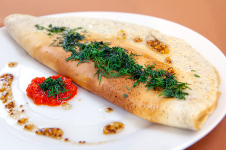 Stuffed omelet with dill for healthy breakfastの写真素材