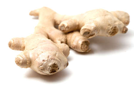The root of ginger isolated on white backgroundの写真素材