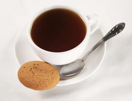 oatmeal cookies and a cup of teaの写真素材