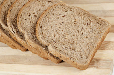 Pieces of grain bread on a board