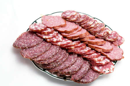 Cutted sausage on a dish for a holiday dinnerの写真素材