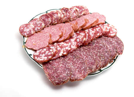 Cutted sausage on a dish for a holiday dinnerの写真素材