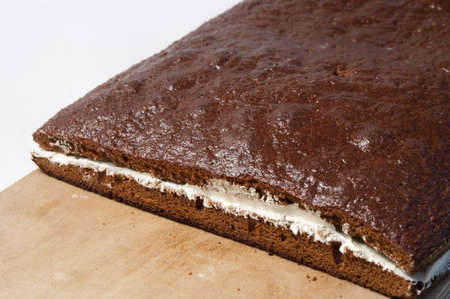 Prague home cake with cream on a board