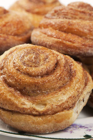 Home made buns with cinnamon, close-up shot