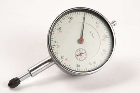 Old mechanical curvimeter over a white background
