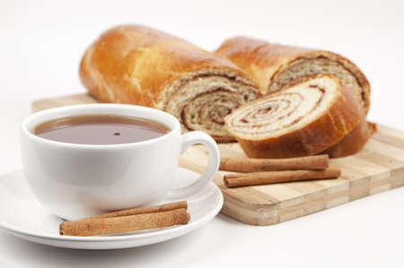Tea and Home-made dessert - sweet rolls with cinnamon fillingの写真素材