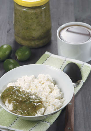 Curd with feijoa (pineapple guava) jam for breakfastの写真素材