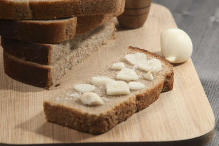 Rye bread with garlic and salt - traditional appetizerの写真素材